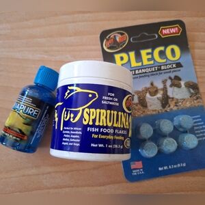 Zoo Med aquarium conditioner and fish food. NEW
